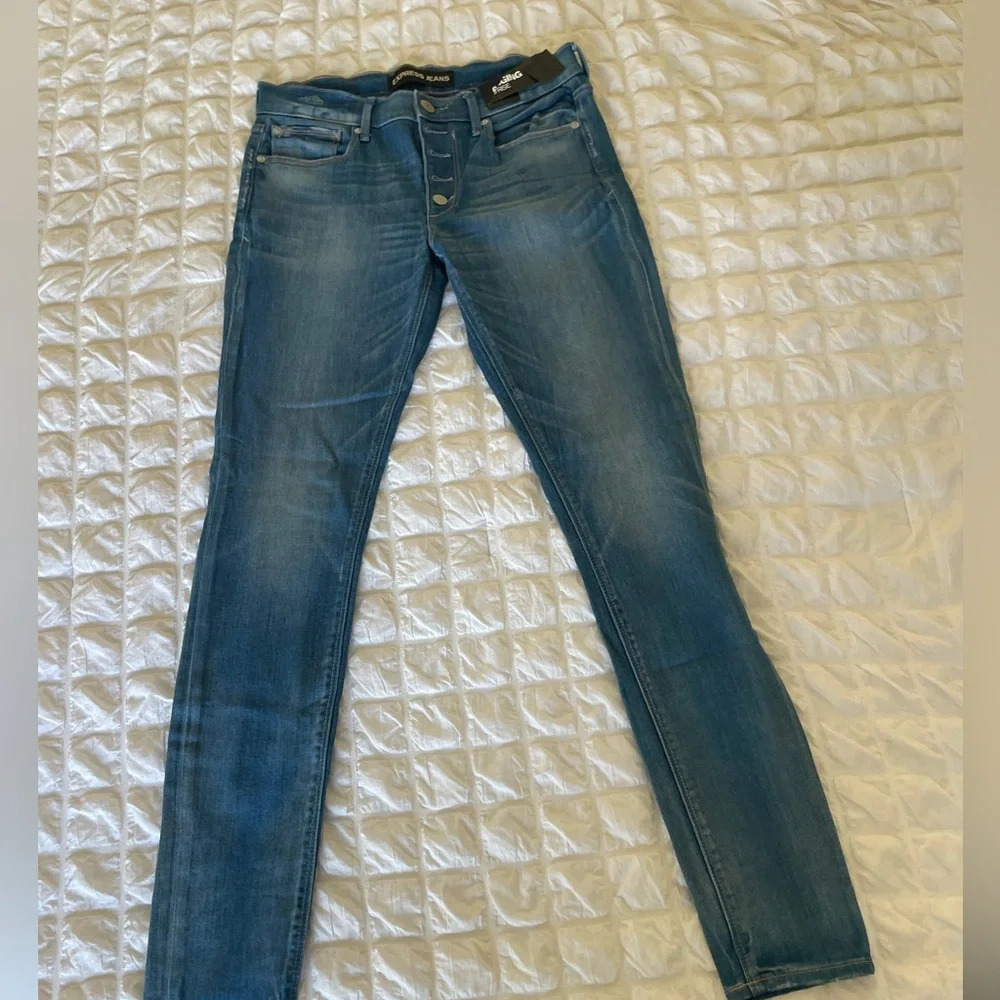 Express mid rise exposed button skinny denim